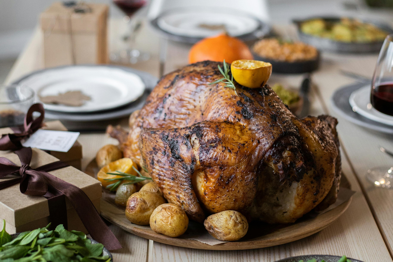 Cooked Thanksgiving turkey on a table.