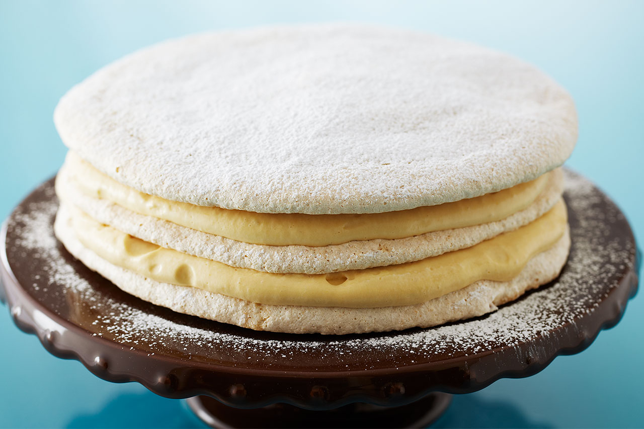 layered cake on a cake decorator