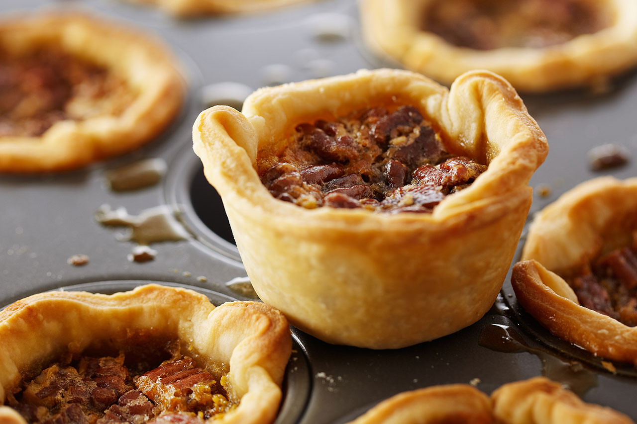 butter tarts in a muffin tin