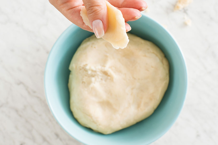 A bowl with the dough for butter tart pastry