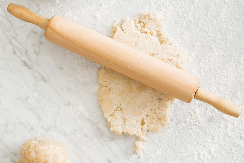 An overhead shot of butter tart pastry rolled out