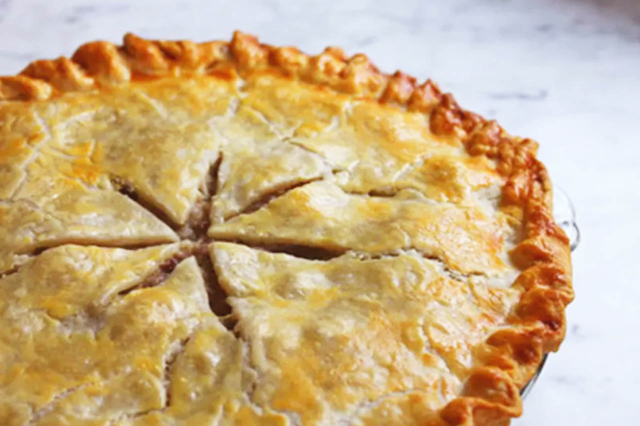 A closeup of an Acadian meat pie