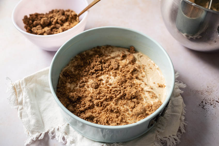 Apple cider cake batter in a cake pan