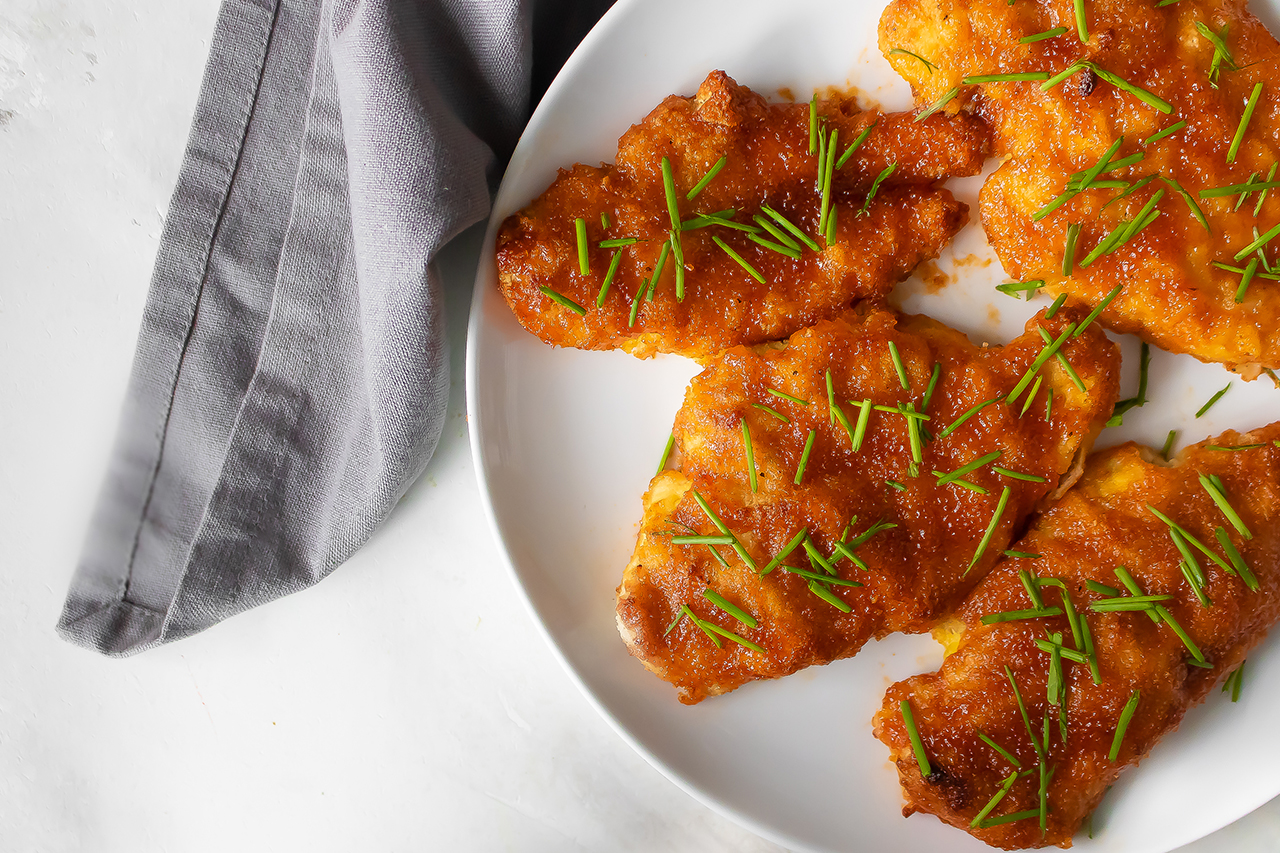 Sriracha chicken tenders on a plate