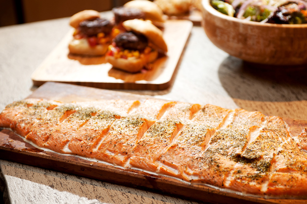 West coast cedar planked salmon on a countertop- Indigenous Peoples recipes