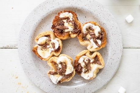 butter tarts on white plate