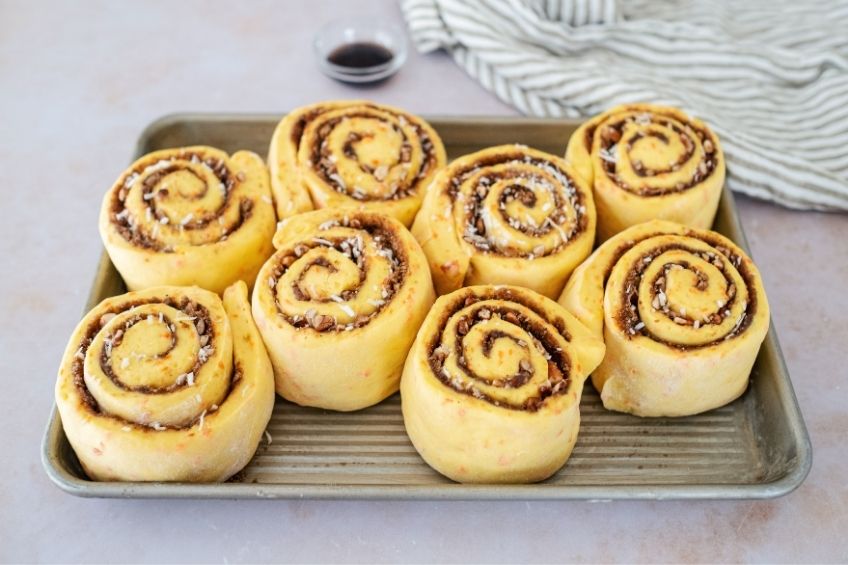 Carrot cake cinnamon rolls before being baked in the oven