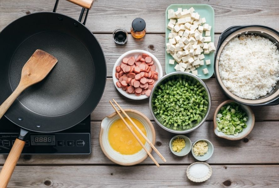 hot dog fried rice ingredients on kitchen counter