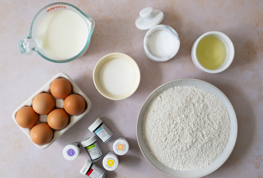 rainbow crepes ingredients on a countertop