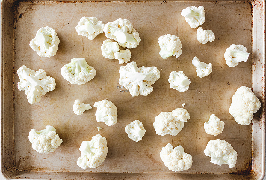 chunks of cauliflower on baking tray