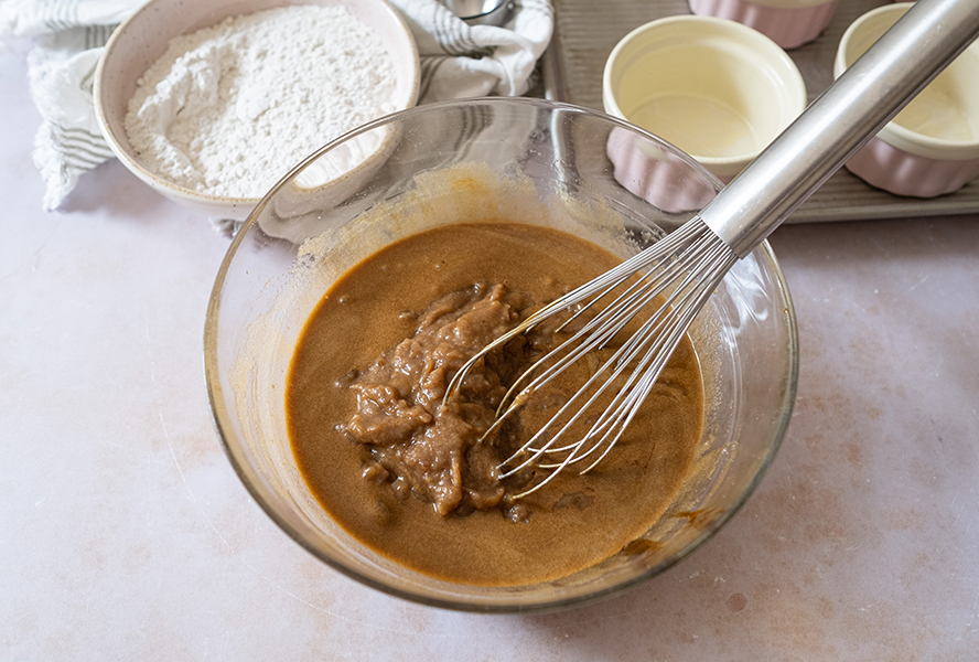 Batter for sticky toffee pudding in a bowl