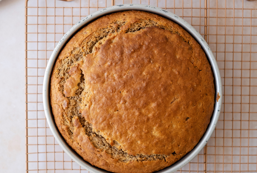 Banana cake cooling on a wire rack