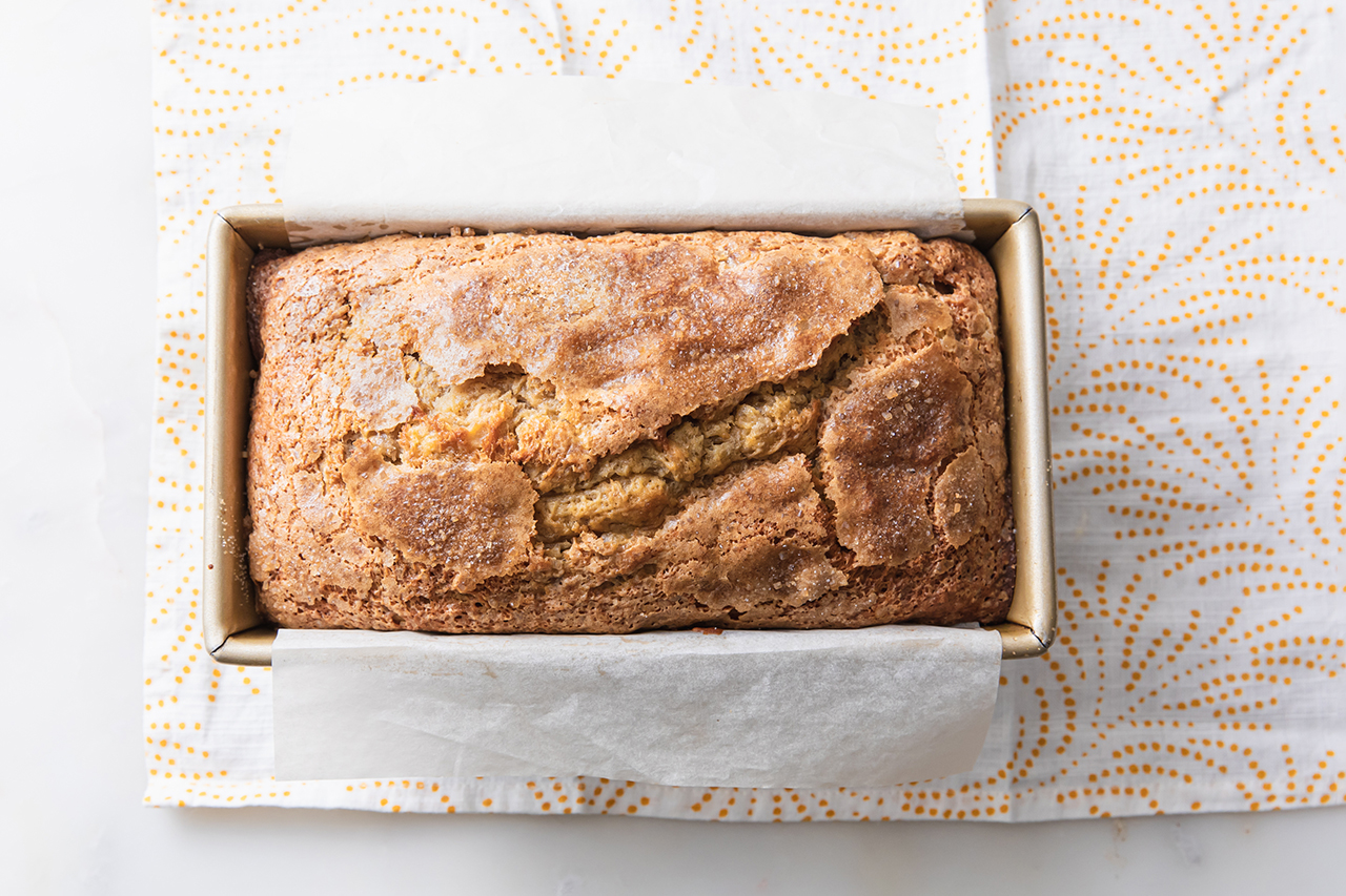 A loaf of banana bread in a pan