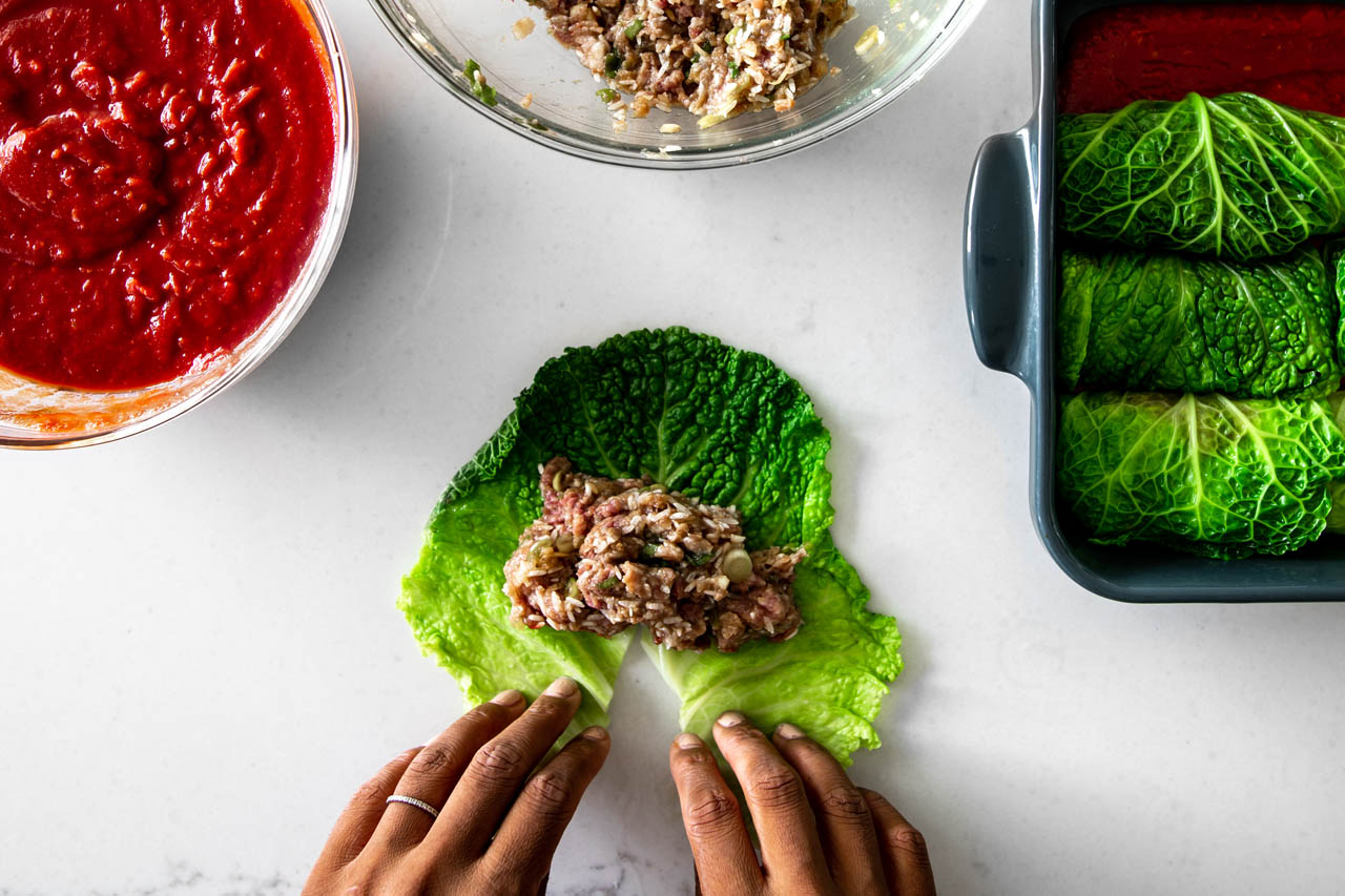 bulgogi cabbage rolls being rolled