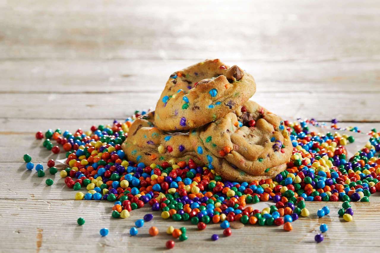 Cookies and candy spilling over countertop