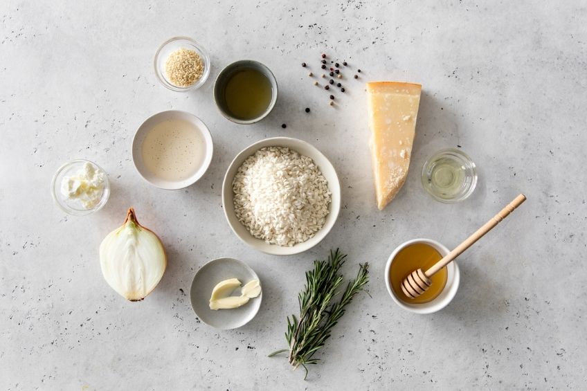 Caramelized risotto ingredients on white countertop