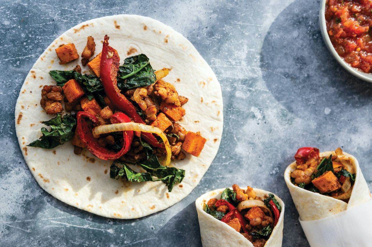 Tempeh breakfast wraps on a stone countertop