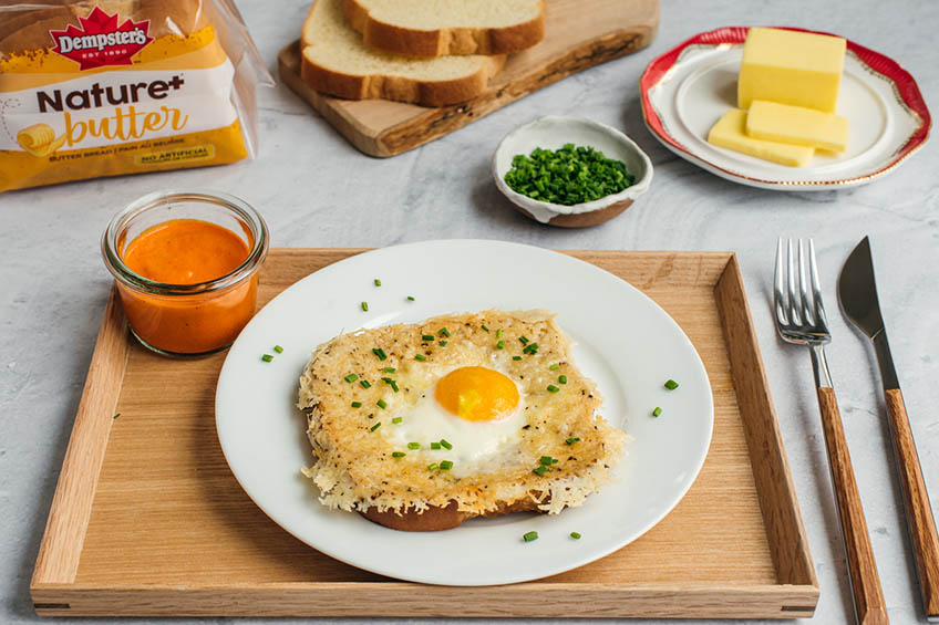 Cacio a pepe egg in a hole on a plate