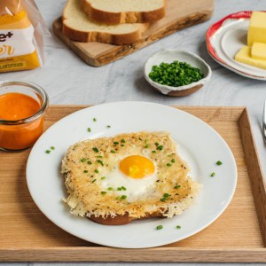 A Delicious Egg in a Hole Recipe With a Cacio e Pepe Twist