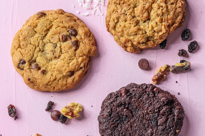 Three cookies on a pink background