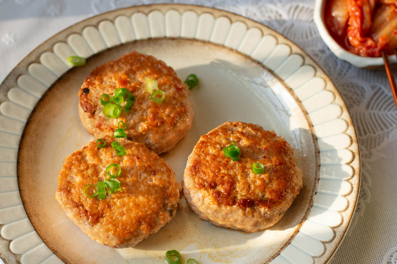 Kimchi chicken patties on a plate