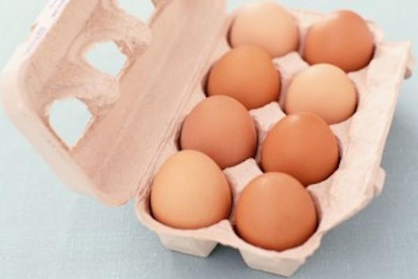 a carton of brown eggs