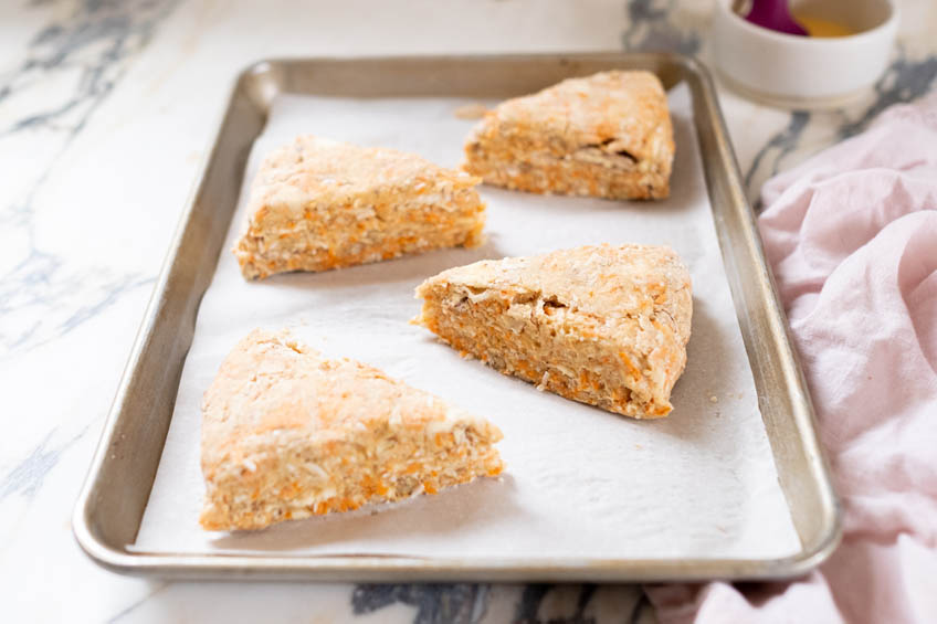 Carrot cake scones on a baking sheet