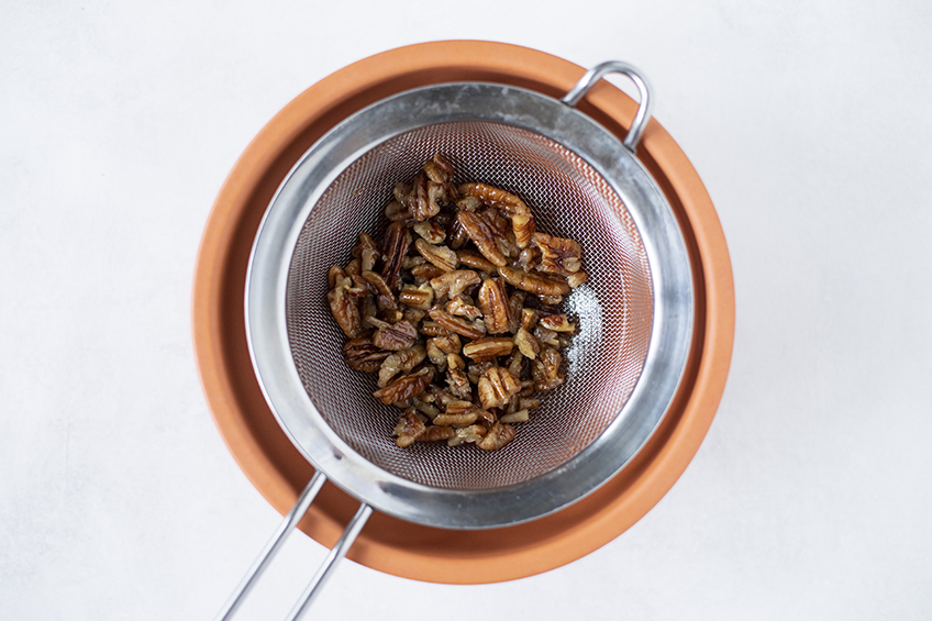 Butter pecan simple syrup having pecans strained