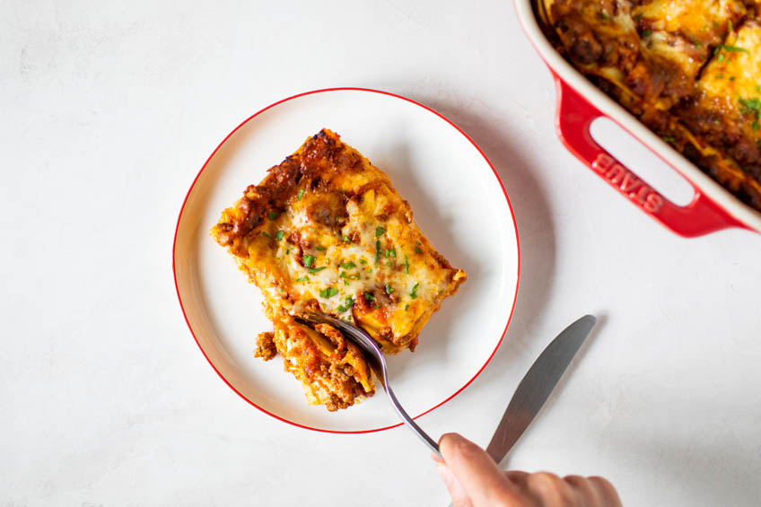 A slice of cottage cheese lasagna on a plate