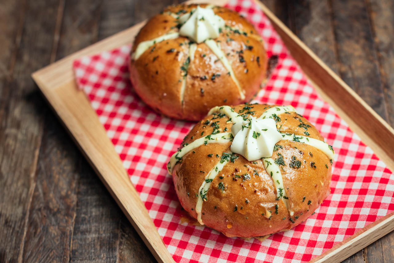 Korean cream cheese garlic bread on a tray