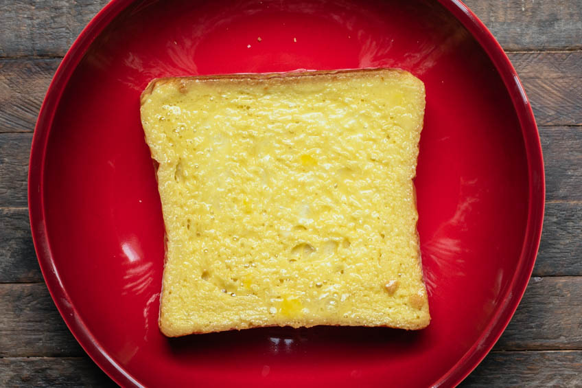 Bread soaked in egg for Hong Kong French Toast