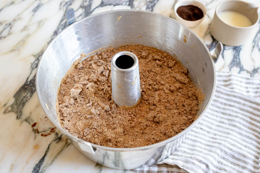 Vietnamese coffee cake batter with streusel in a bundt pan