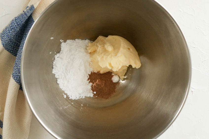 Ingredients for Gingerbread Spiced Shortbread Wreath Cookies in a mixing bowl