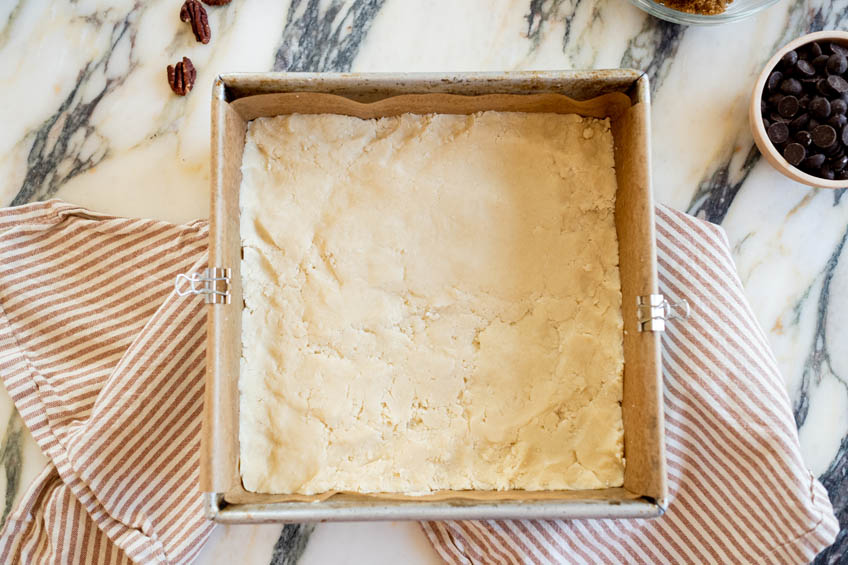 Shortbread base for brown butter maple pecan squares.