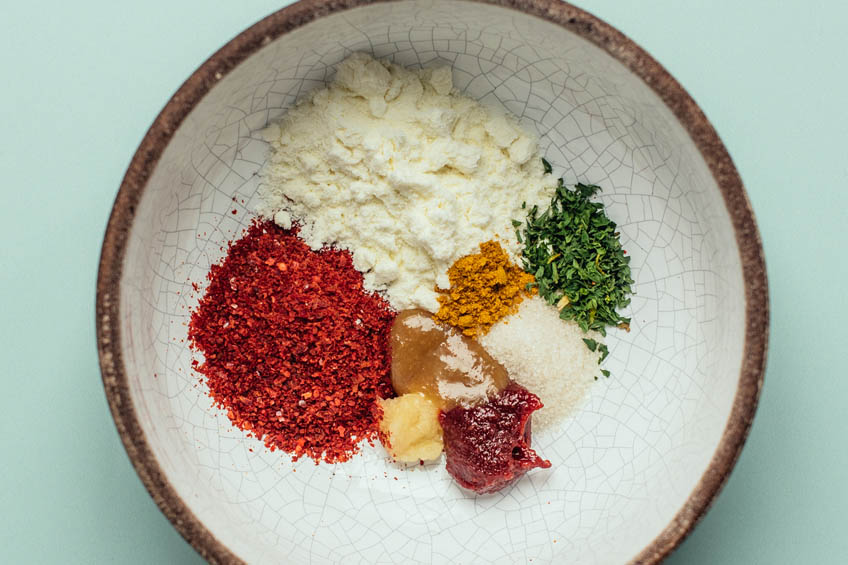 Seasoning for fiery udon carbonara in a bowl