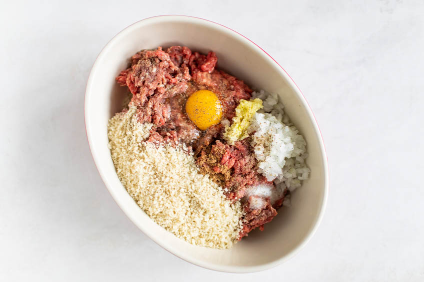 Ingredients for air fryer meatballs in a bowl