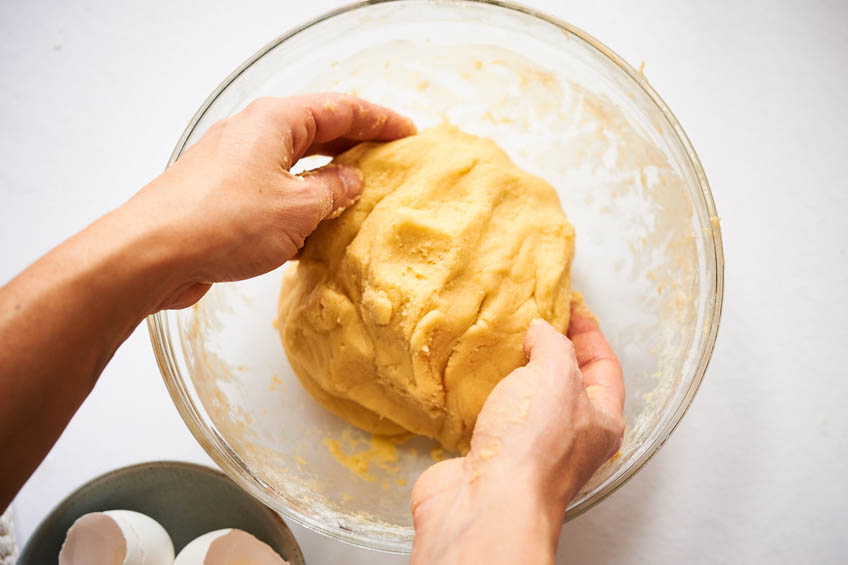 A glass bowl with a cinnamon cookie dough