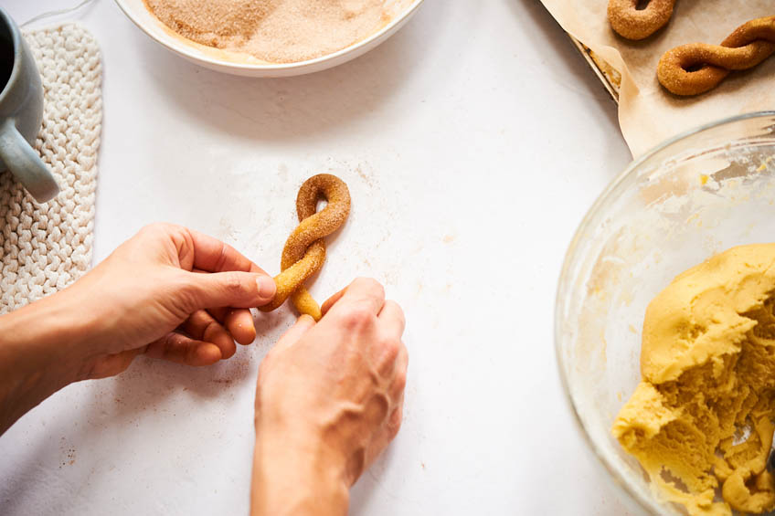 Dough for cinnamon twist cookies being twisted