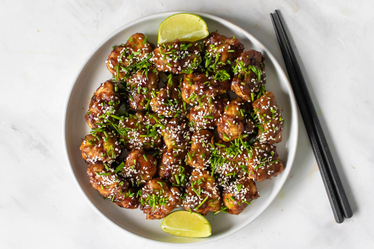 Oven-fried honey garlic chicken bites on a plate