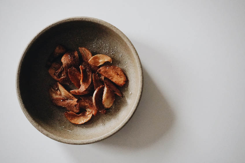 Crispy garlic slices in a small bowl