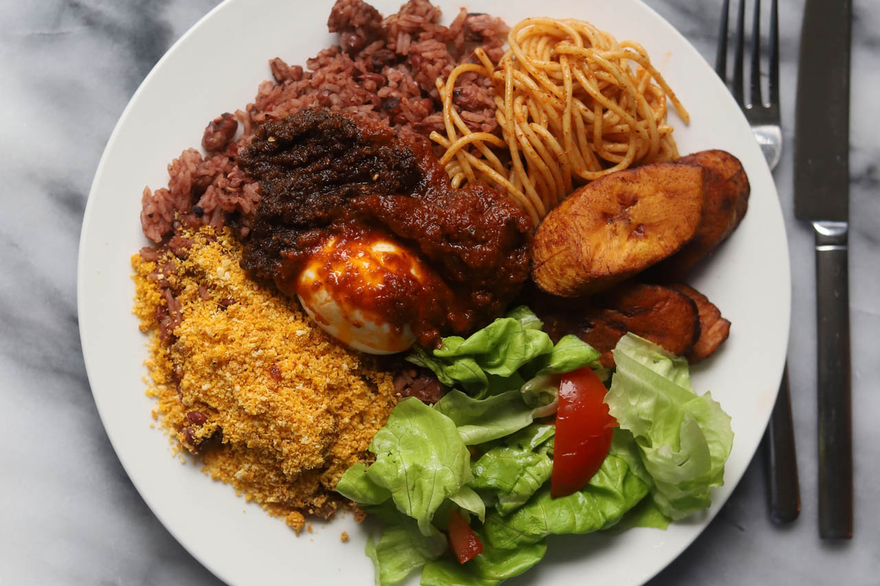 A plate of waakye and other sides