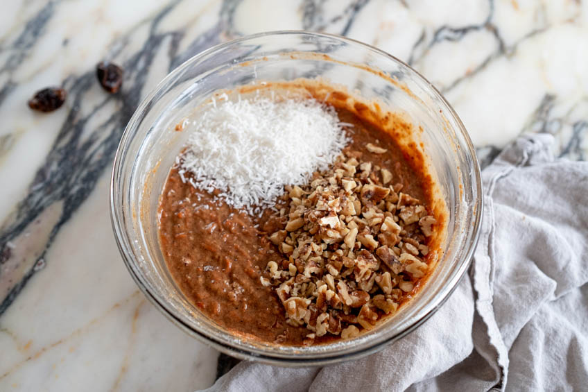 Carrot cake ingredients in a mixing bowl