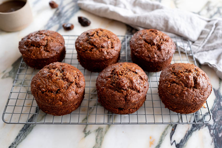 Mini carrot cakes cooling on a wire rack