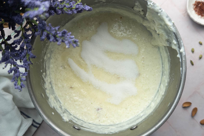 A pot of kheer with sugar on top