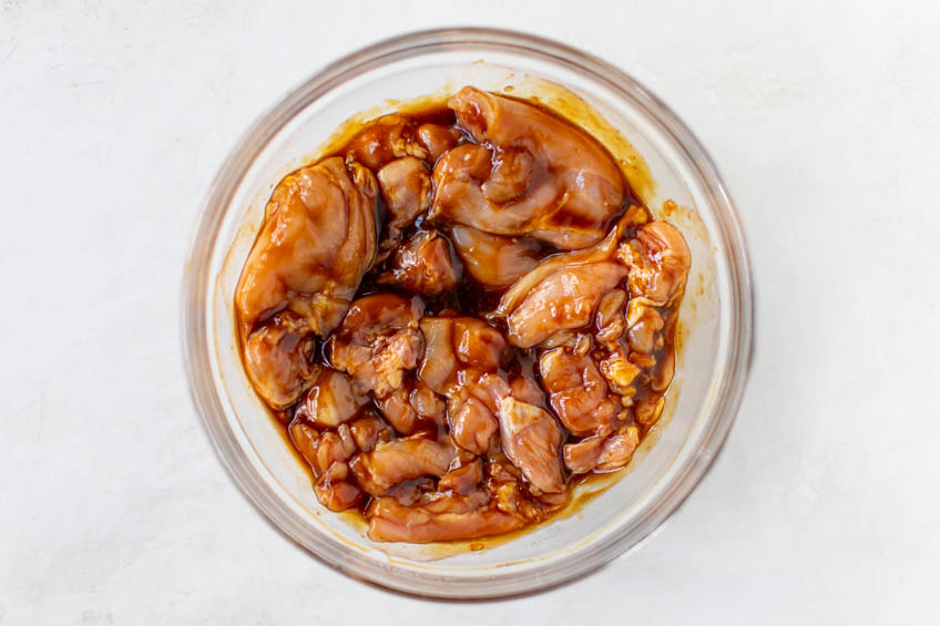 Chicken marinating for Air Fryer Hoisin Glazed Chicken Thighs