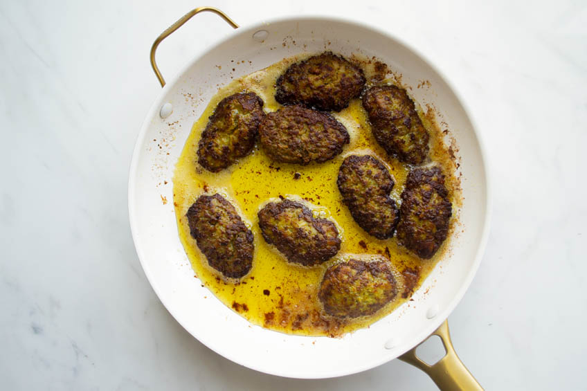 Cooked beef kotlet in a pan