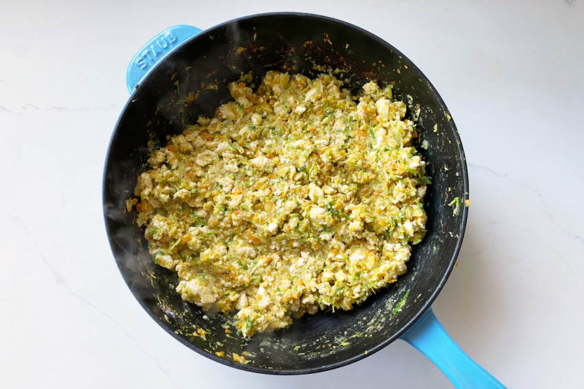 Sauteed vegetables in a large wok