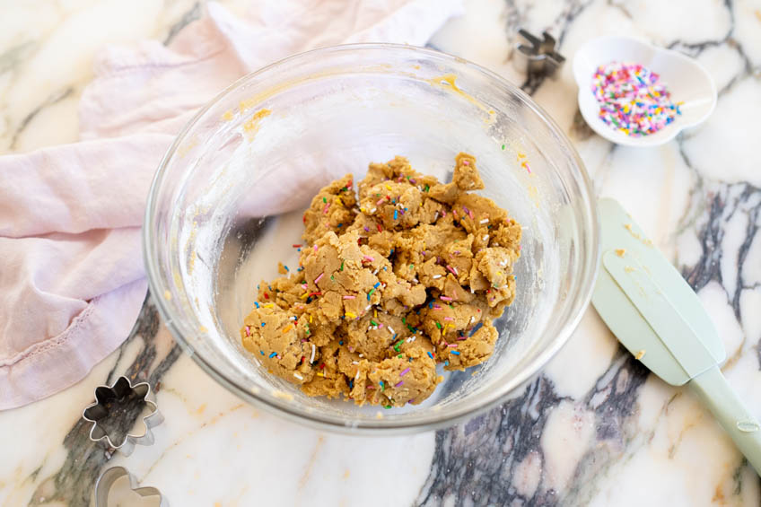 Funfetti cookie dough in a mixing bowl