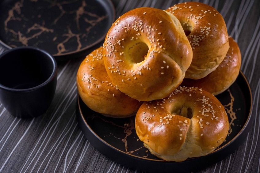 Bagels on a black serving plate