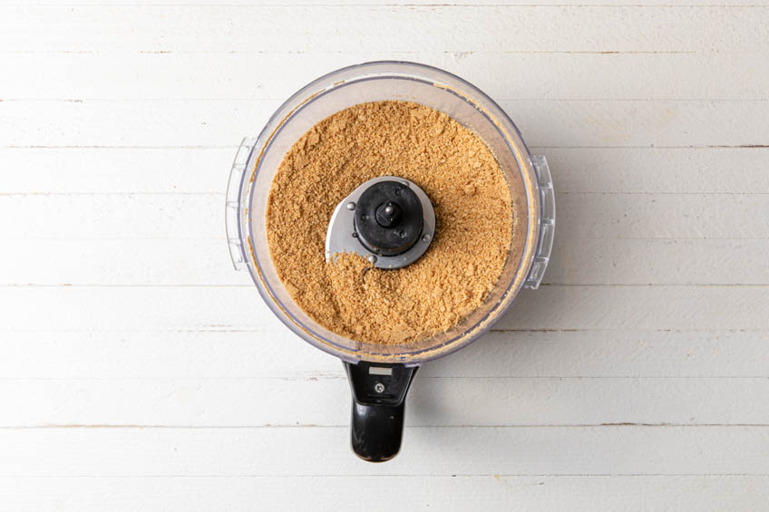 Graham cracker crumbs in a food processor